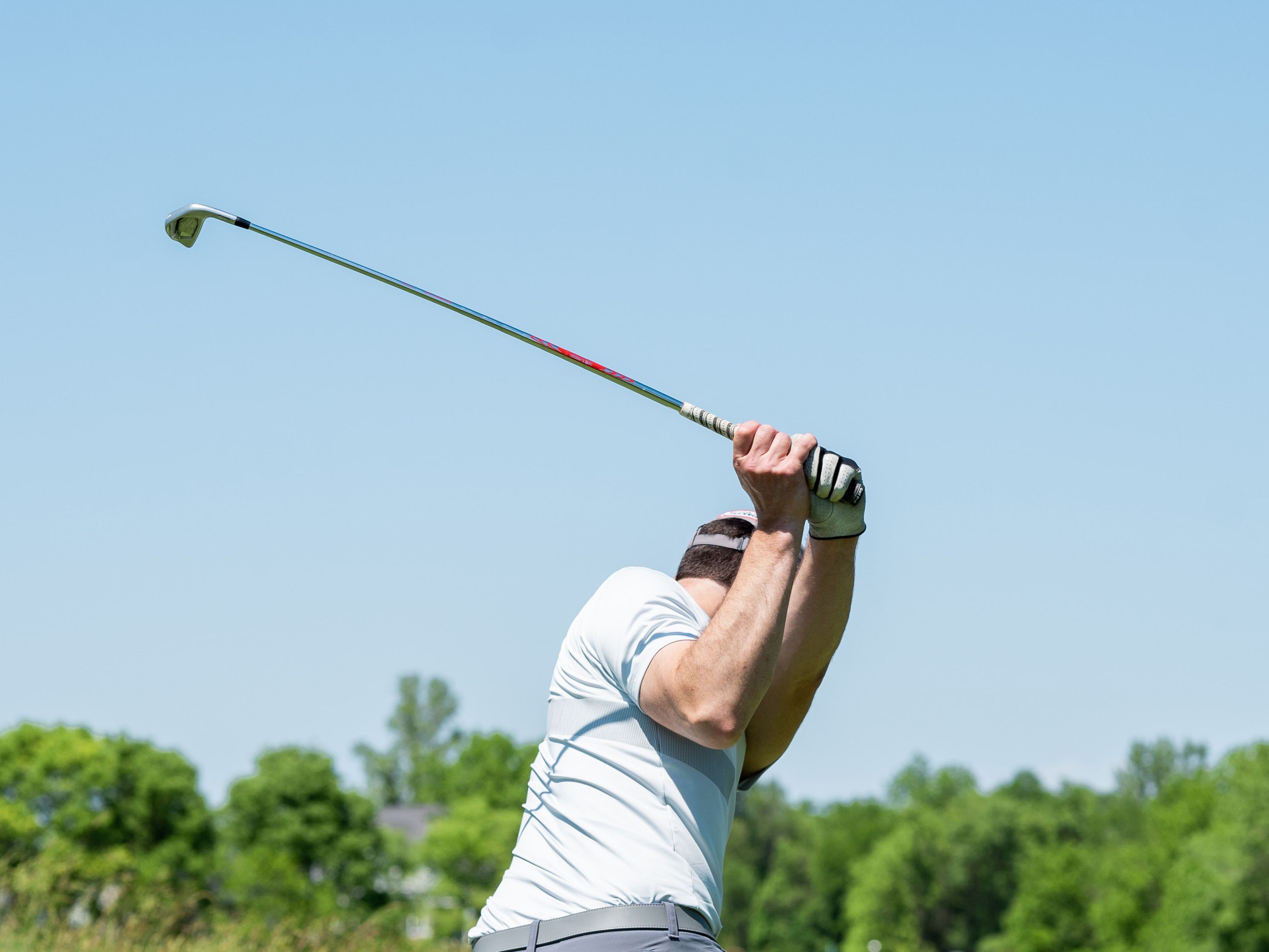 Golfer about to start the downswing of his golf swing